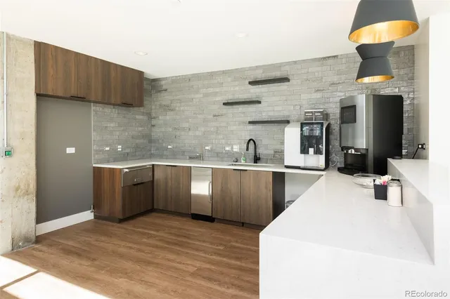 a living room with couches and furniture