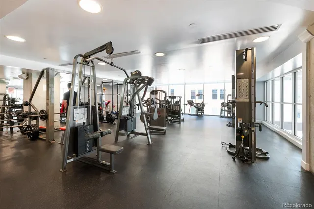 a view of a hall with wooden floor