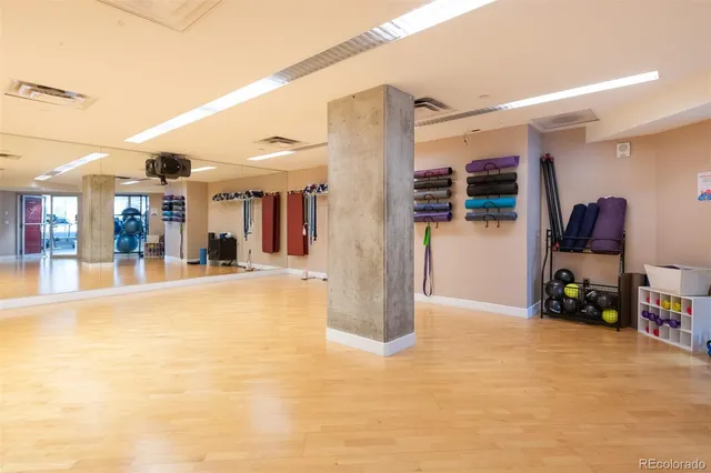 a view of a garage with cars