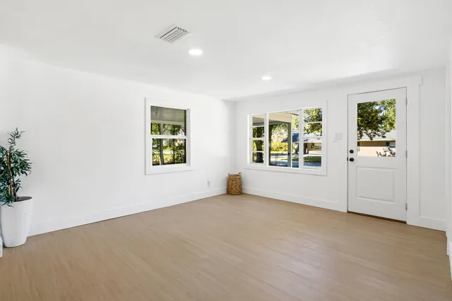 an empty room with windows