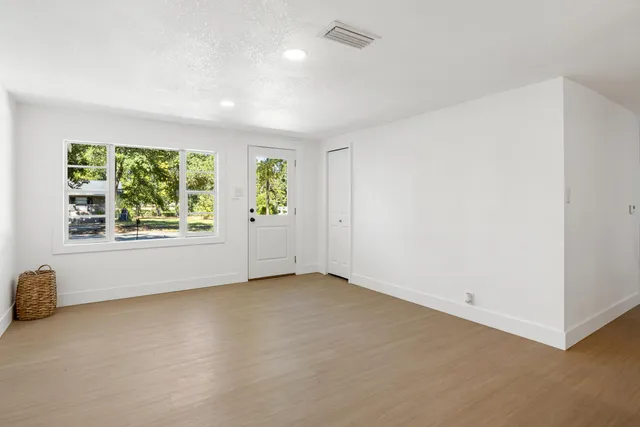 an empty room with windows