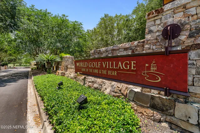 a view of a street with benches in the background