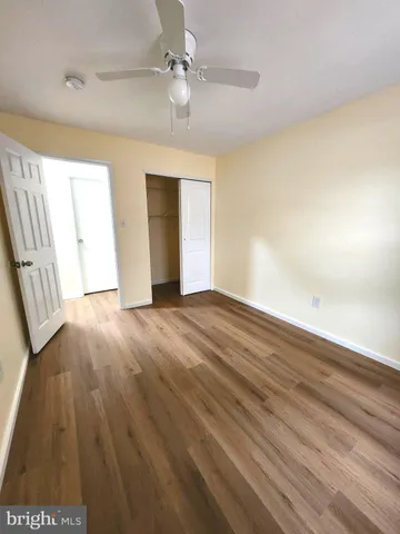 a bathroom with a sink vanity and mirror