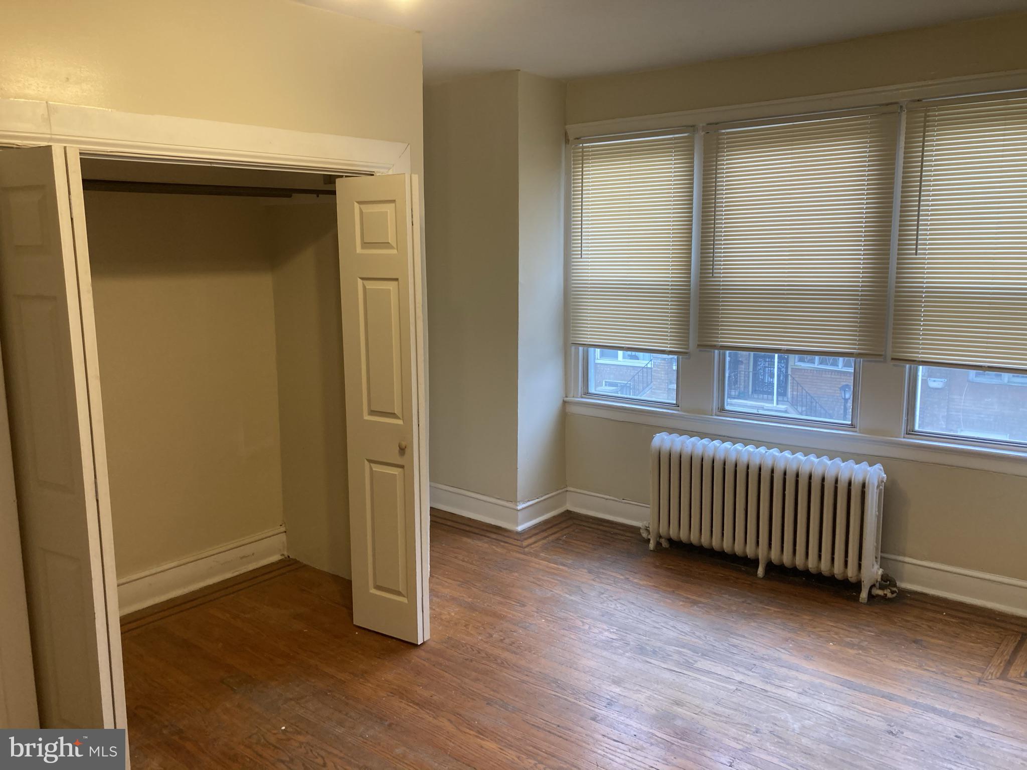 3145 North Patton Street Philadelphia, PA 19132 - Photo 8 of 16 an empty room with windows