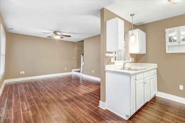 a bathroom with a sink double vanity and a mirror
