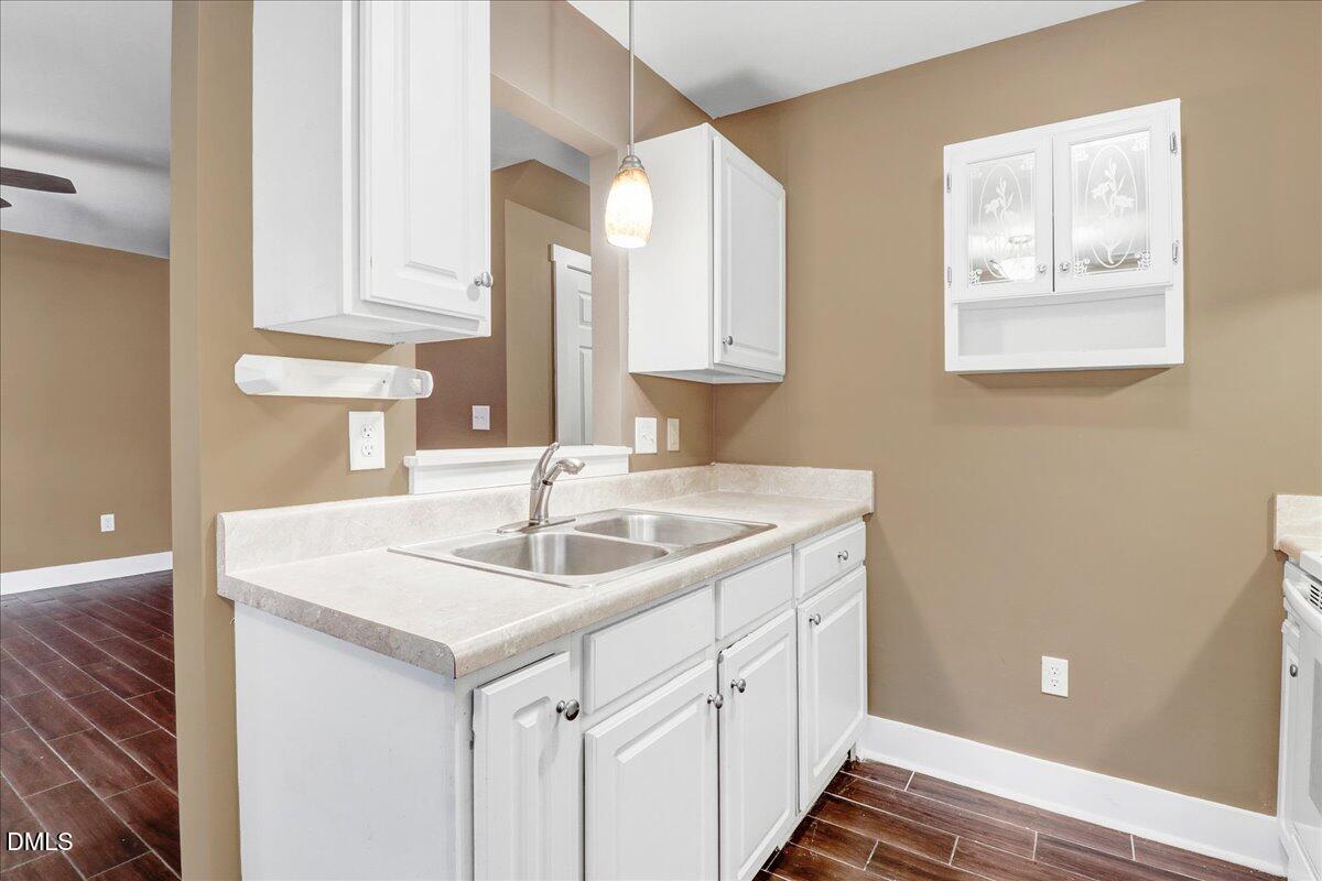 51 Birch Street Elizabethtown, NC 28337 - Photo 14 of 42 a kitchen with a sink and cabinets