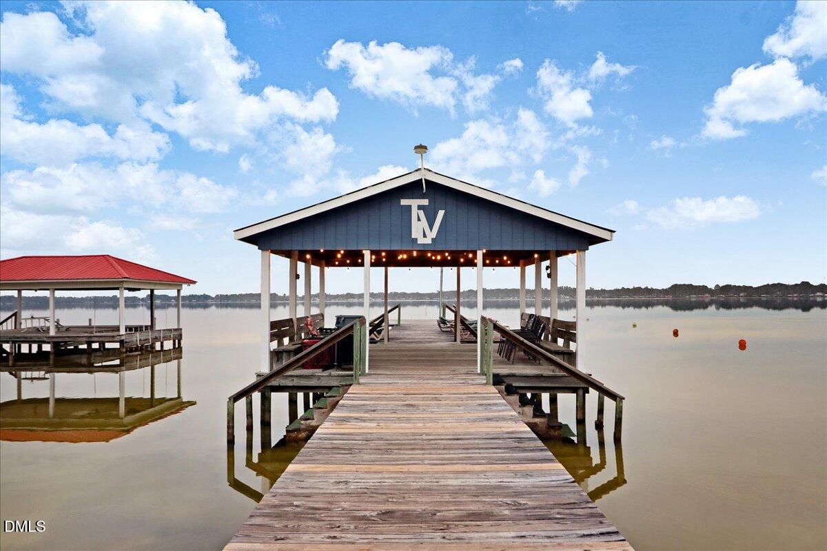 51 Birch Street Elizabethtown, NC 28337 - Photo 35 of 42 a view of a house with swimming pool and sitting area