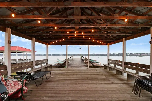 a view of a lake with sitting area