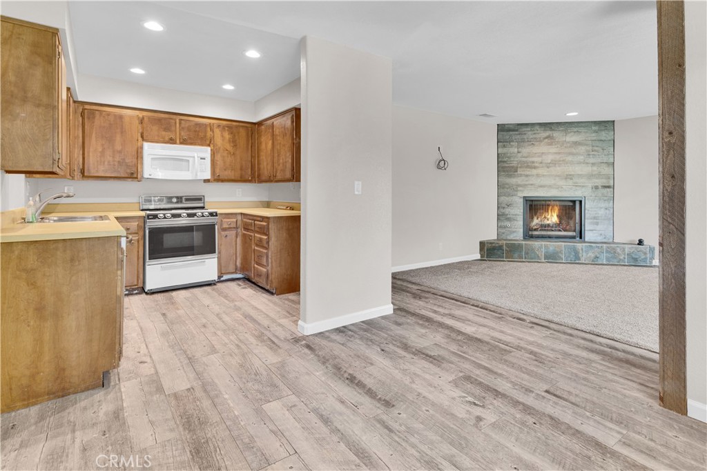1991 Brook Lane Paso Robles, CA 93446 - Photo 8 of 29 a large kitchen with stainless steel appliances granite countertop a stove and a refrigerator