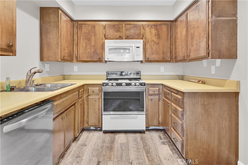 1991 Brook Lane Paso Robles, CA 93446 - Photo 9 of 29 a kitchen with a sink stove and cabinets