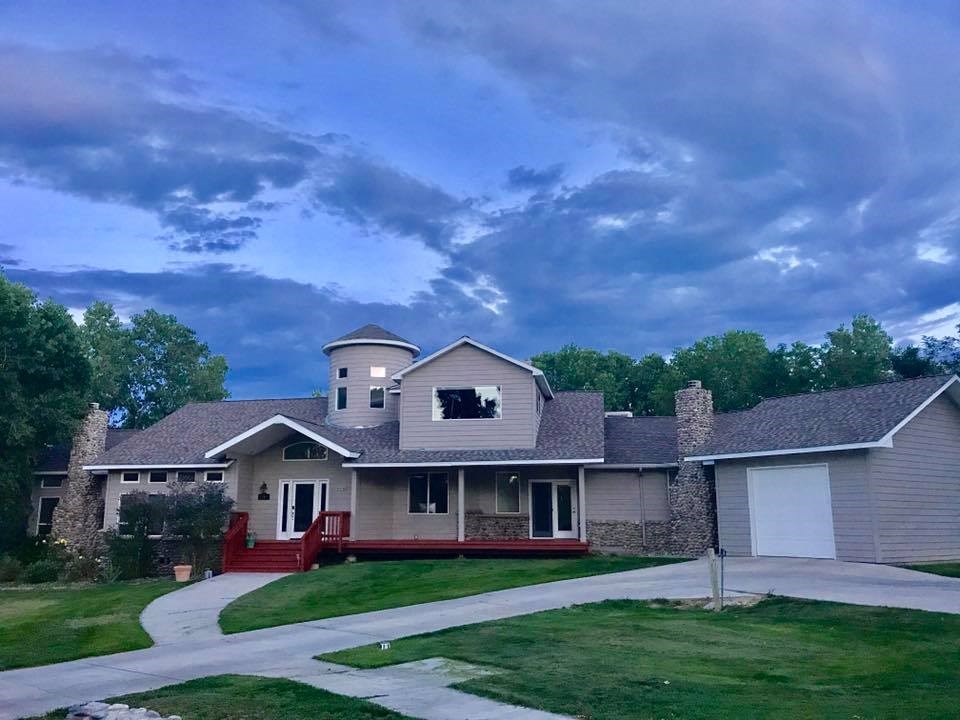 2565 I Road Grand Junction, CO 81505 - Photo 1 of 1 front view of a house with a yard
