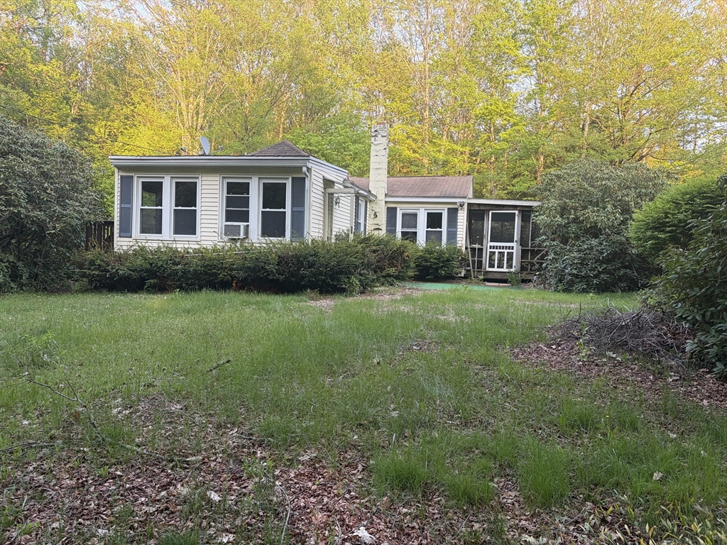 a house view with a garden space