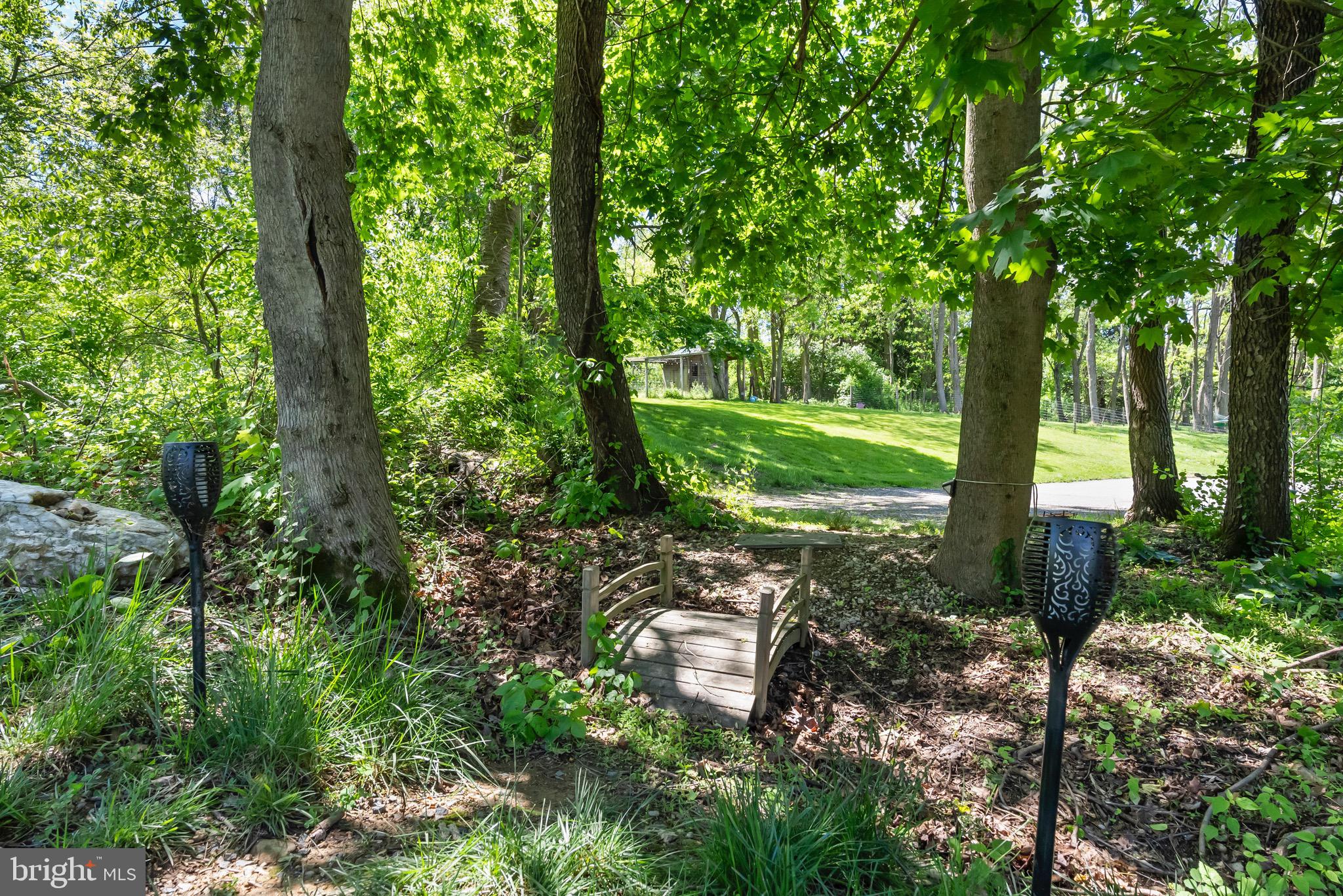 419 Corner Ketch Road Downingtown, PA 19335 - Photo 42 of 53 Bridge leading to fire pit area