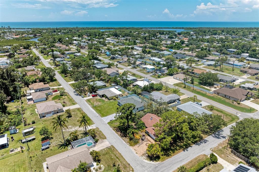 1010 Acadia Road Venice, FL 34293 - Photo 1 of 1 an aerial view of residential building and green space