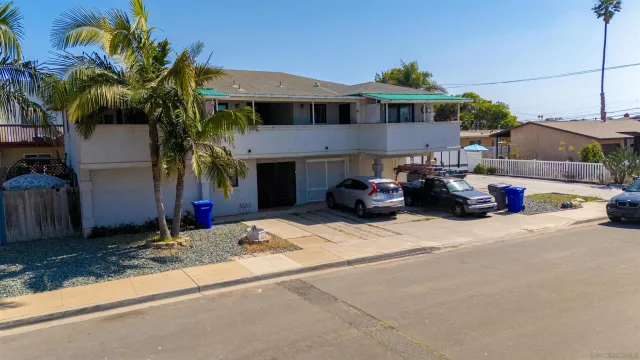 a car parked in front of a house