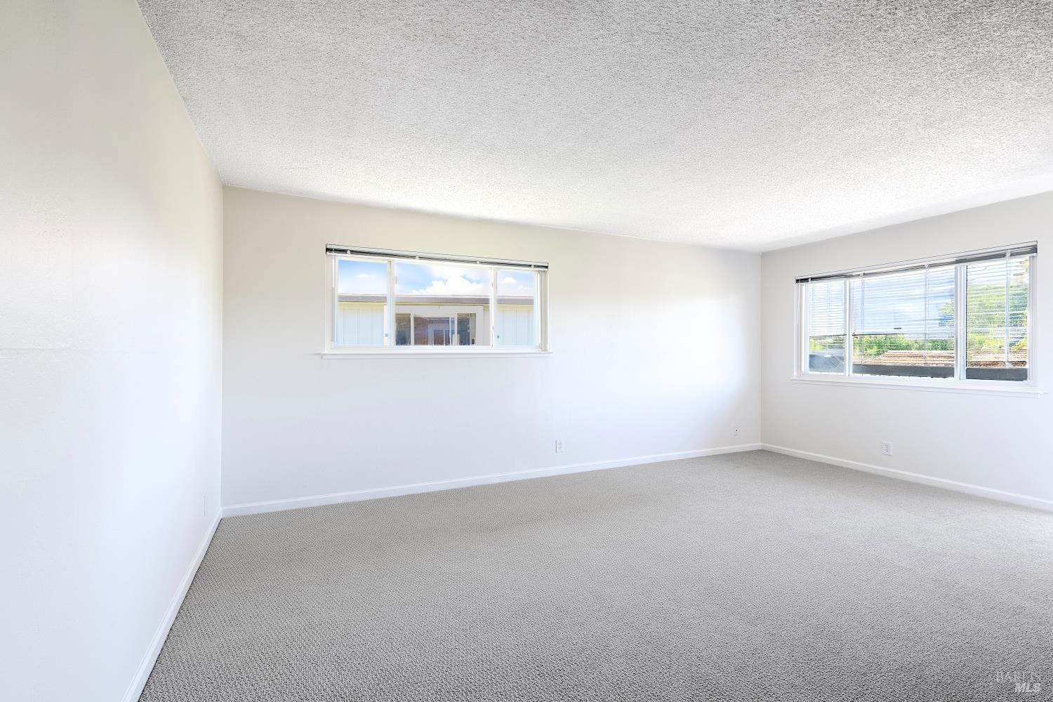 247 Bahia Place San Rafael, CA 94901 - Photo 7 of 22 an empty room with windows