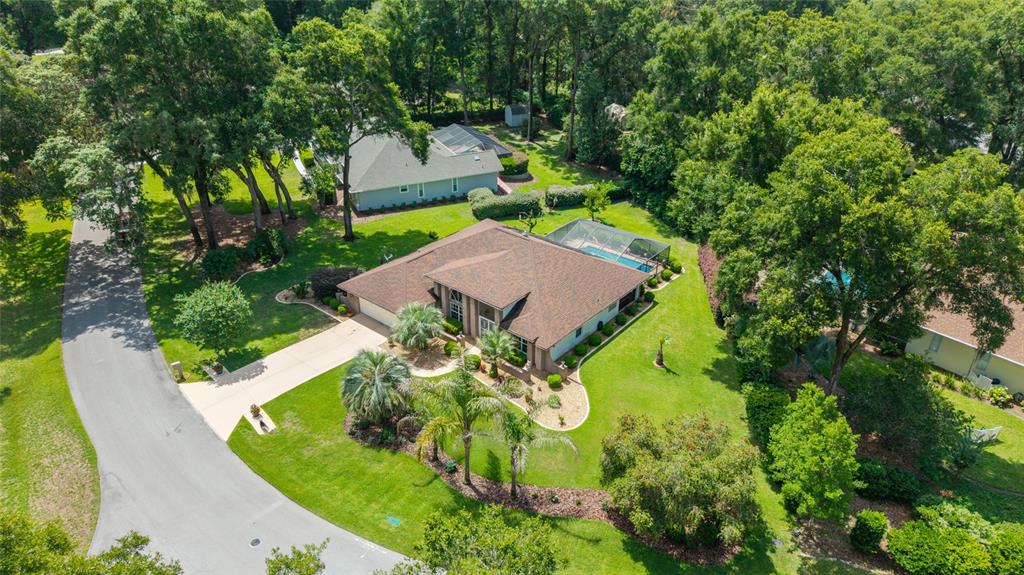 18825 Southwest 93rd Loop Dunnellon, FL 34432 - Photo 68 of 85 an aerial view of a house with a garden