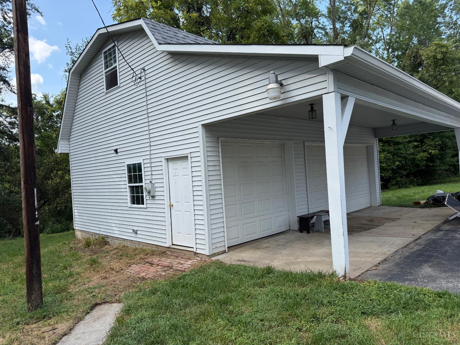 3535 Lewis Road Amelia, OH 45102 - Photo 5 of 46 This 3 car detached garage has electric and a loft for extra storage.