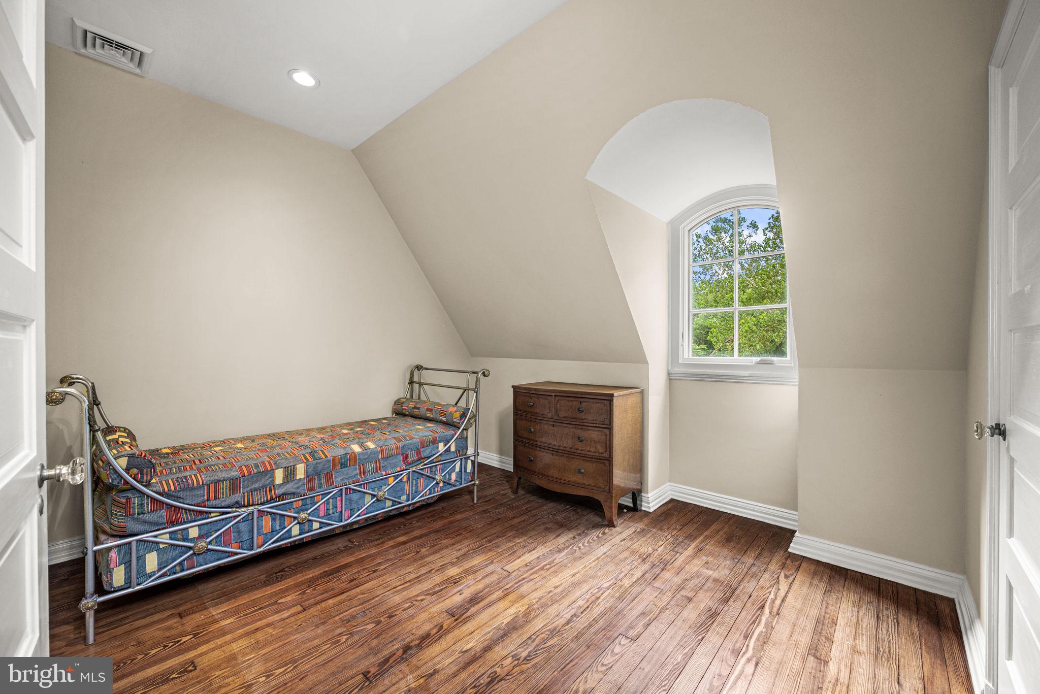 42 West Bells Mill Road Philadelphia, PA 19118 - Photo 29 of 43 a bedroom with a bunk bed and a window