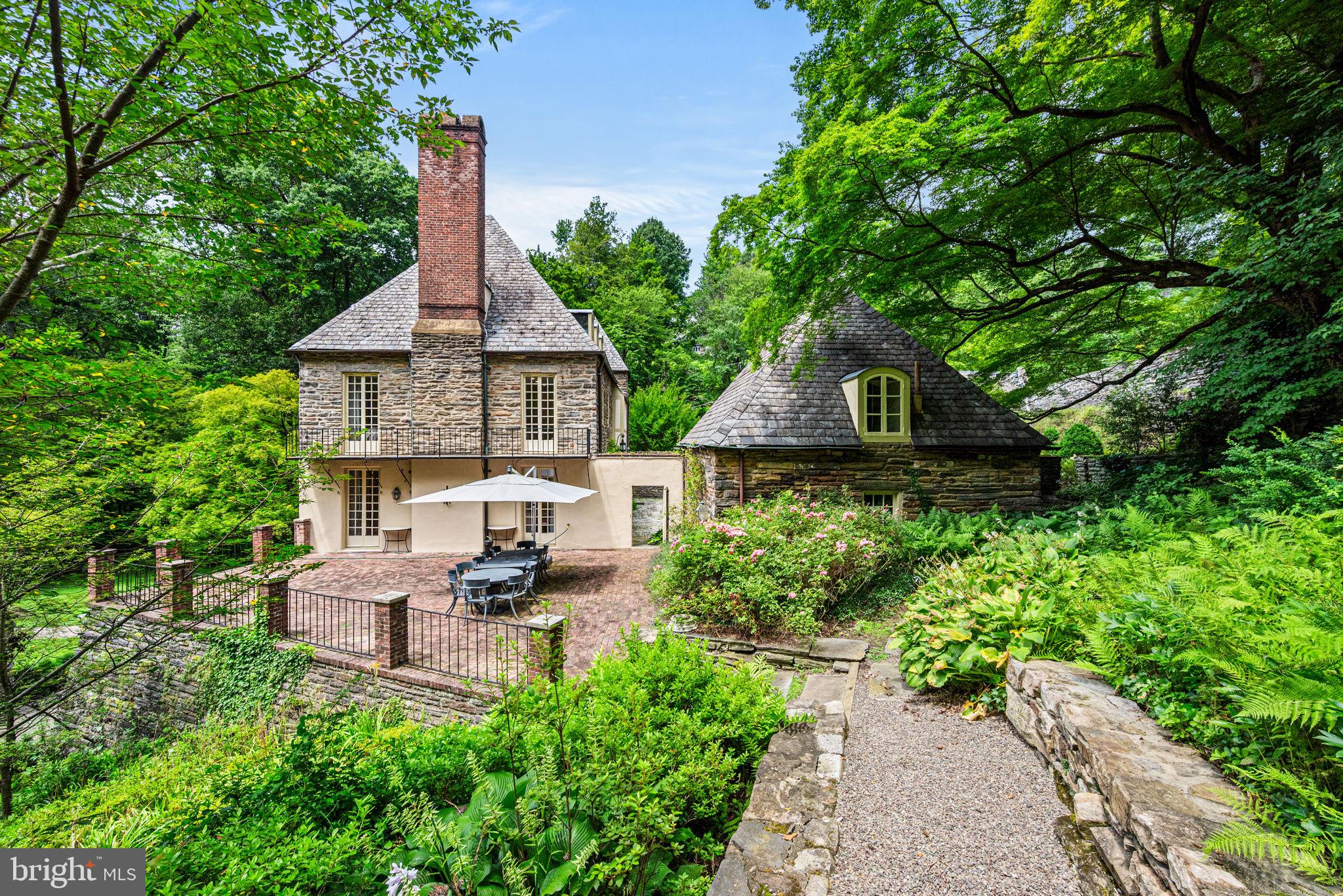 42 West Bells Mill Road Philadelphia, PA 19118 - Photo 35 of 43 a front view of house with a garden
