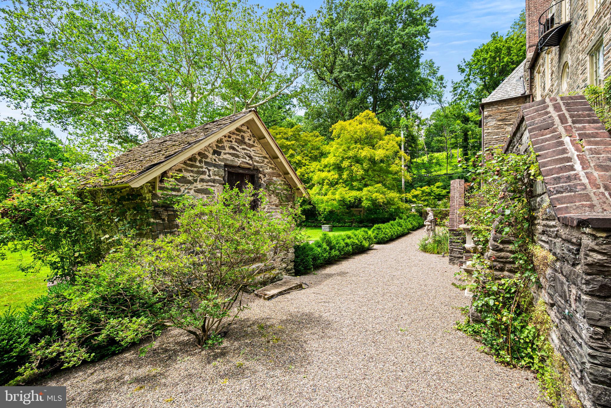 42 West Bells Mill Road Philadelphia, PA 19118 - Photo 37 of 43 a view of a garden with pathway