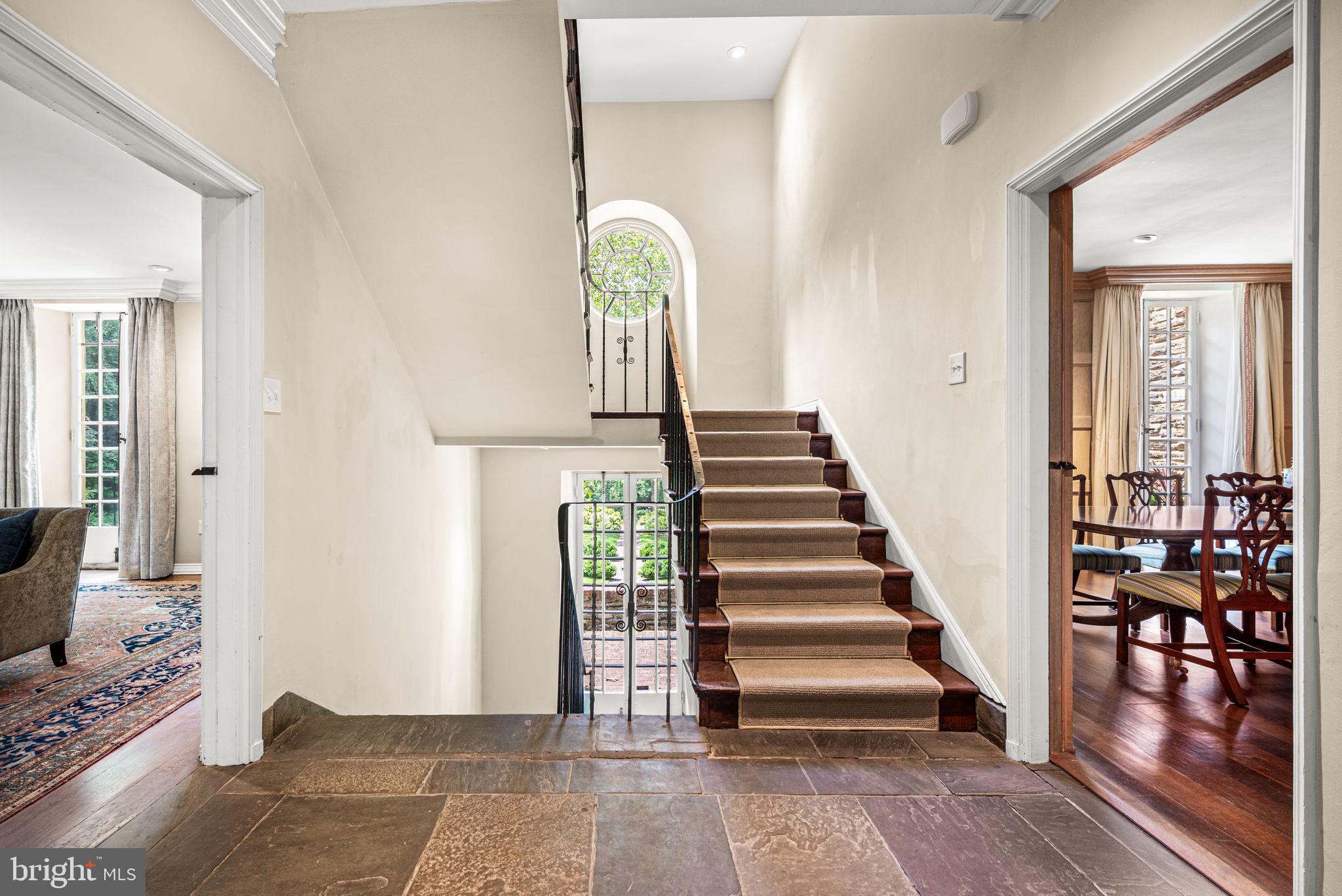 42 West Bells Mill Road Philadelphia, PA 19118 - Photo 5 of 43 a view of entryway and hall with wooden floor