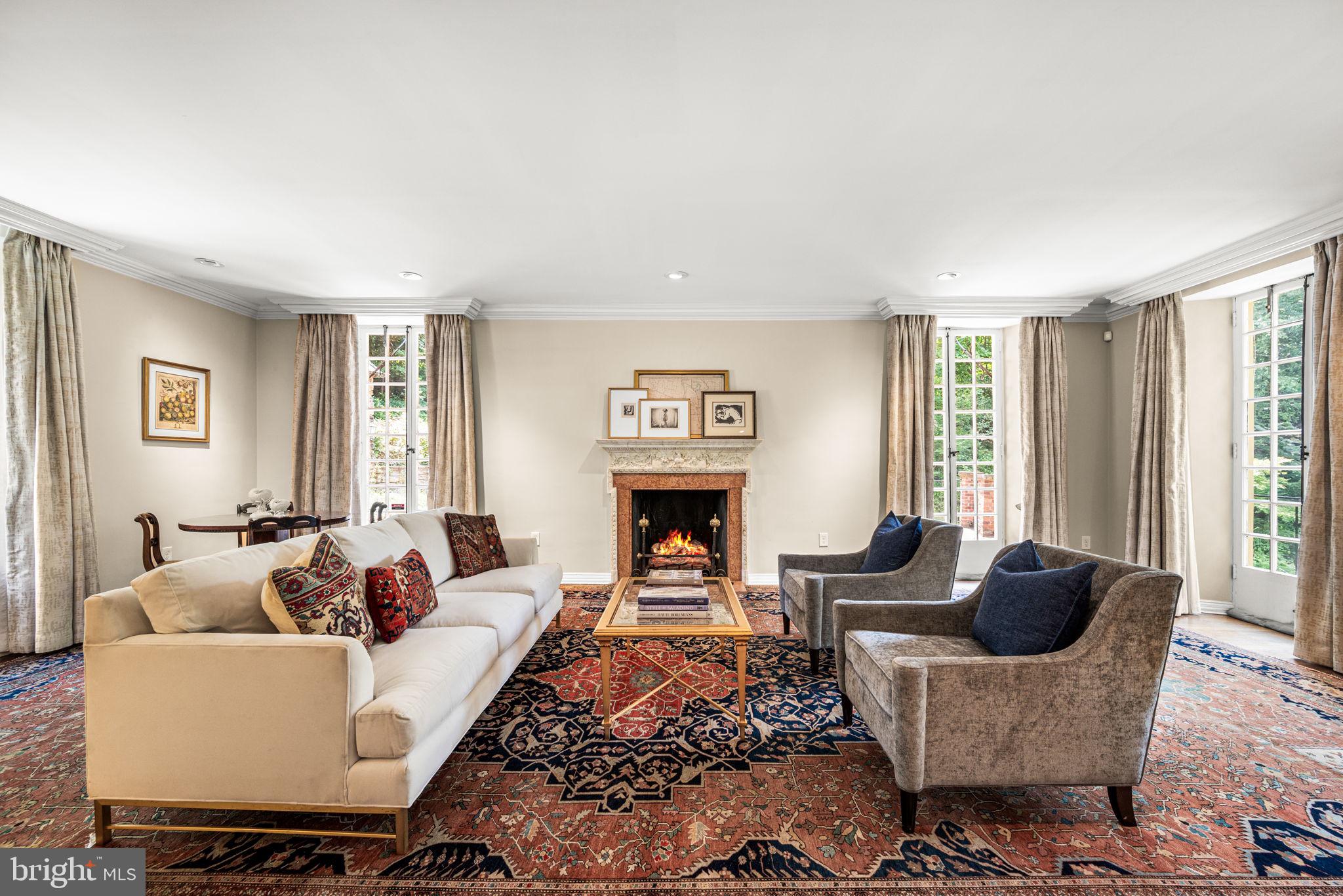 42 West Bells Mill Road Philadelphia, PA 19118 - Photo 6 of 43 a living room with furniture and a fireplace