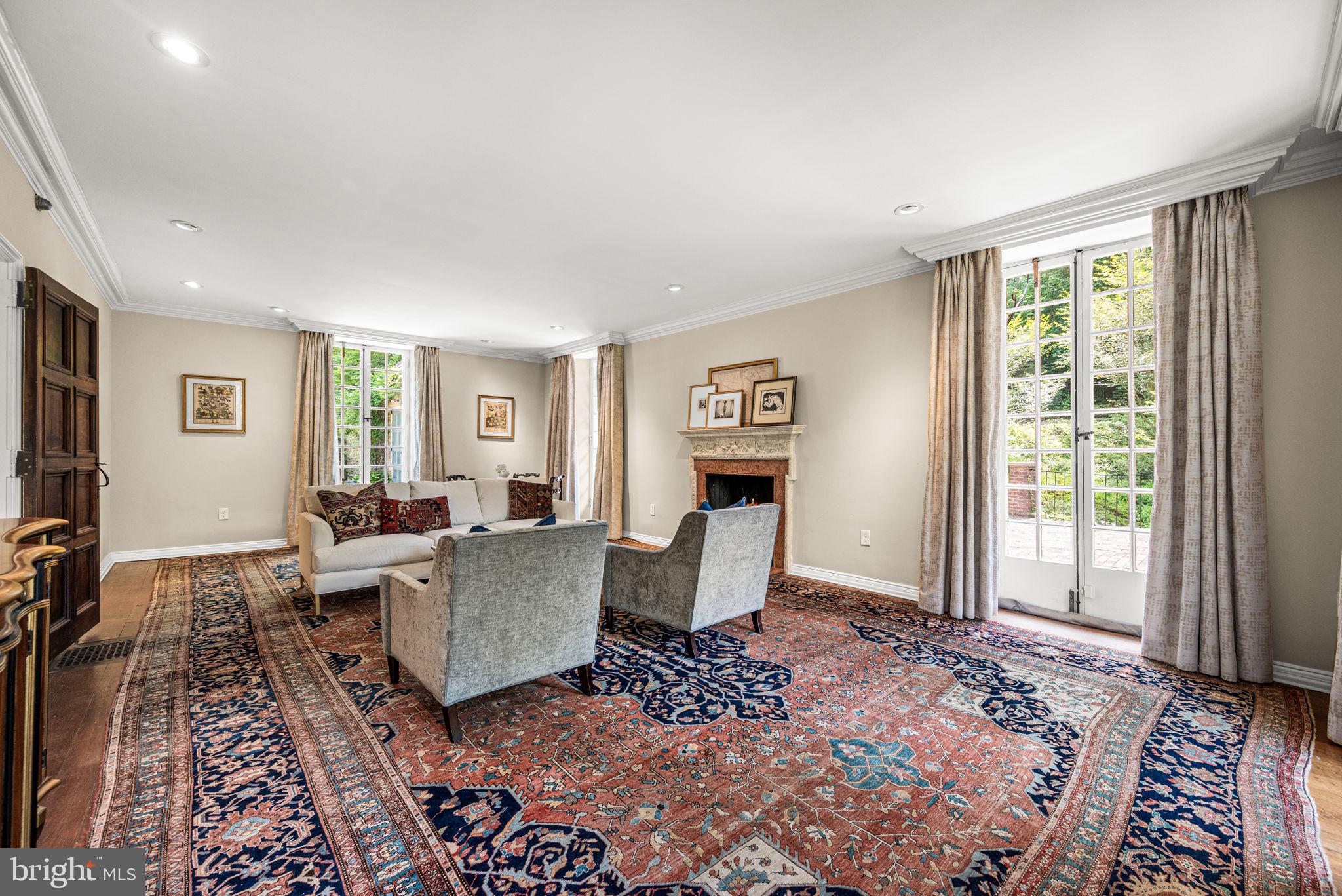 42 West Bells Mill Road Philadelphia, PA 19118 - Photo 7 of 43 a living room with furniture and a window