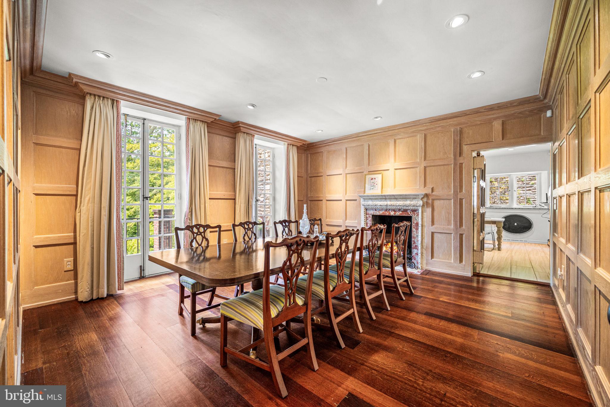 42 West Bells Mill Road Philadelphia, PA 19118 - Photo 8 of 43 a view of a dining room with furniture window and wooden floor