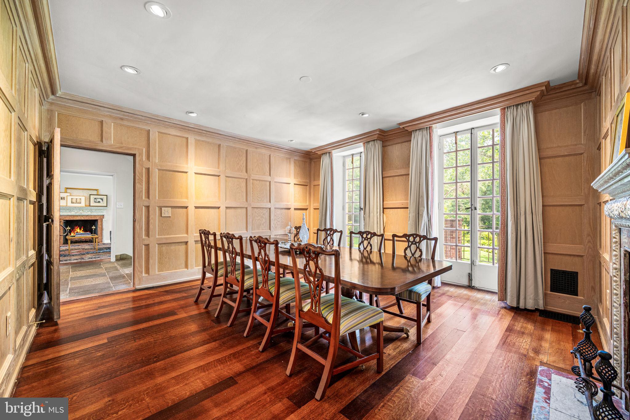 42 West Bells Mill Road Philadelphia, PA 19118 - Photo 10 of 43 a view of a dining room with furniture window and wooden floor