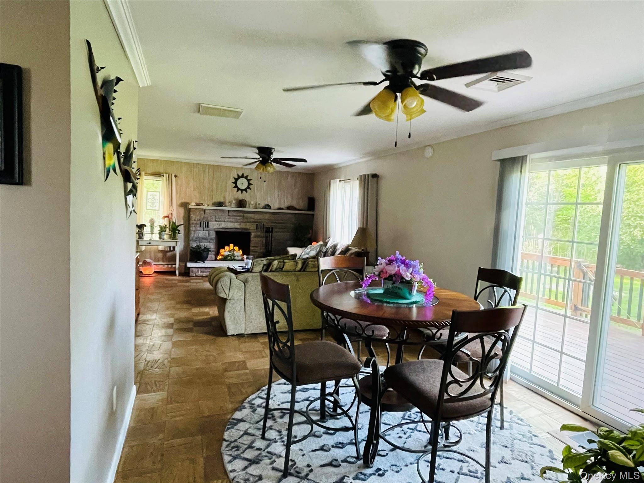 137 Cross Road Goshen, NY 10924 - Photo 11 of 50 Open concept Dining room with sliding glass doors that lead to the back deck and yard.