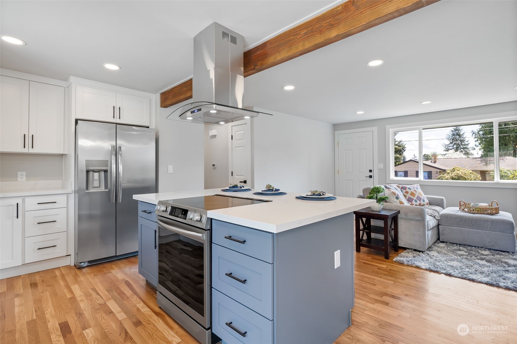 103 234th Street Southwest Bothell, WA 98021 - Photo 12 of 30 a kitchen with stainless steel appliances a stove a refrigerator and a refrigerator