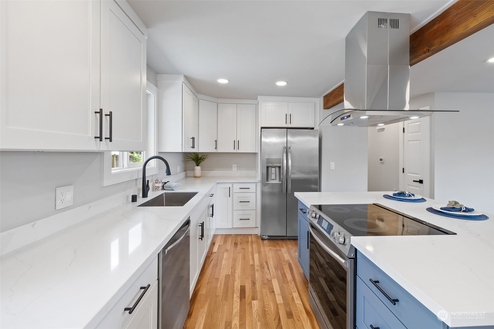 103 234th Street Southwest Bothell, WA 98021 - Photo 14 of 30 a kitchen with stainless steel appliances granite countertop a sink stove and refrigerator