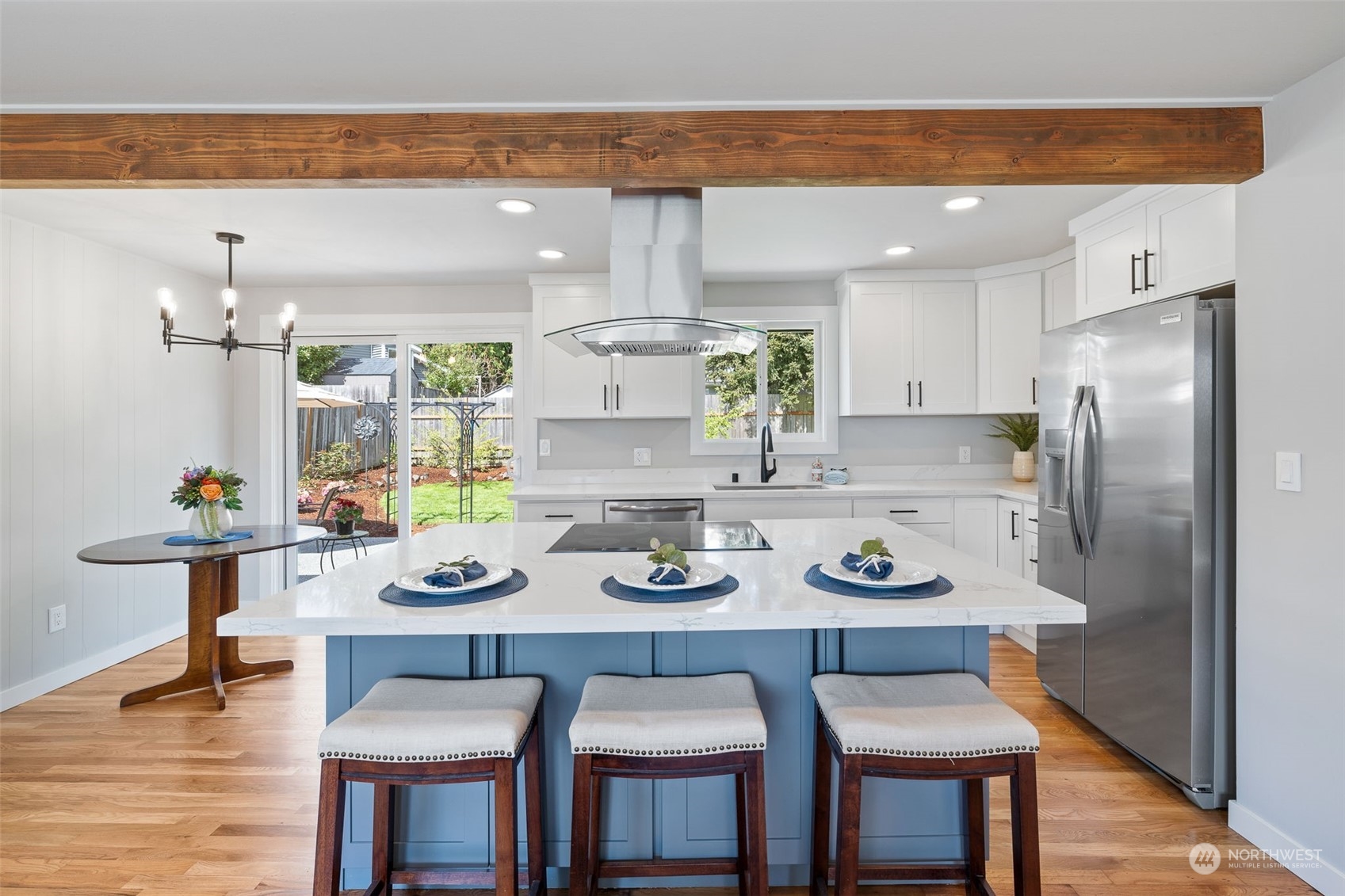103 234th Street Southwest Bothell, WA 98021 - Photo 16 of 30 a view of a dining room with furniture and wooden floor