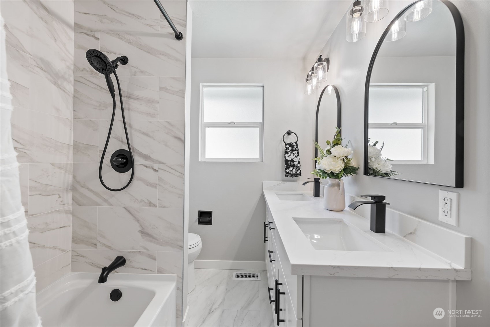 103 234th Street Southwest Bothell, WA 98021 - Photo 18 of 30 a bathroom with a sink a toilet and shower