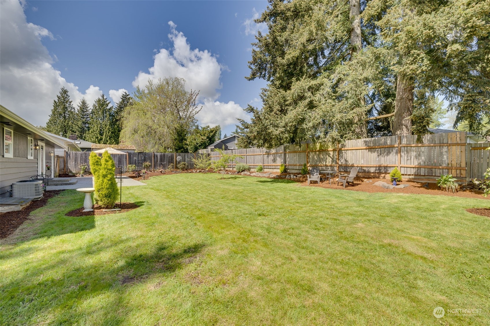 103 234th Street Southwest Bothell, WA 98021 - Photo 26 of 30 a view of a garden with a slide