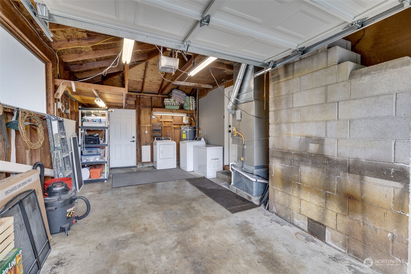 103 234th Street Southwest Bothell, WA 98021 - Photo 30 of 30 a view of empty room with wooden walls