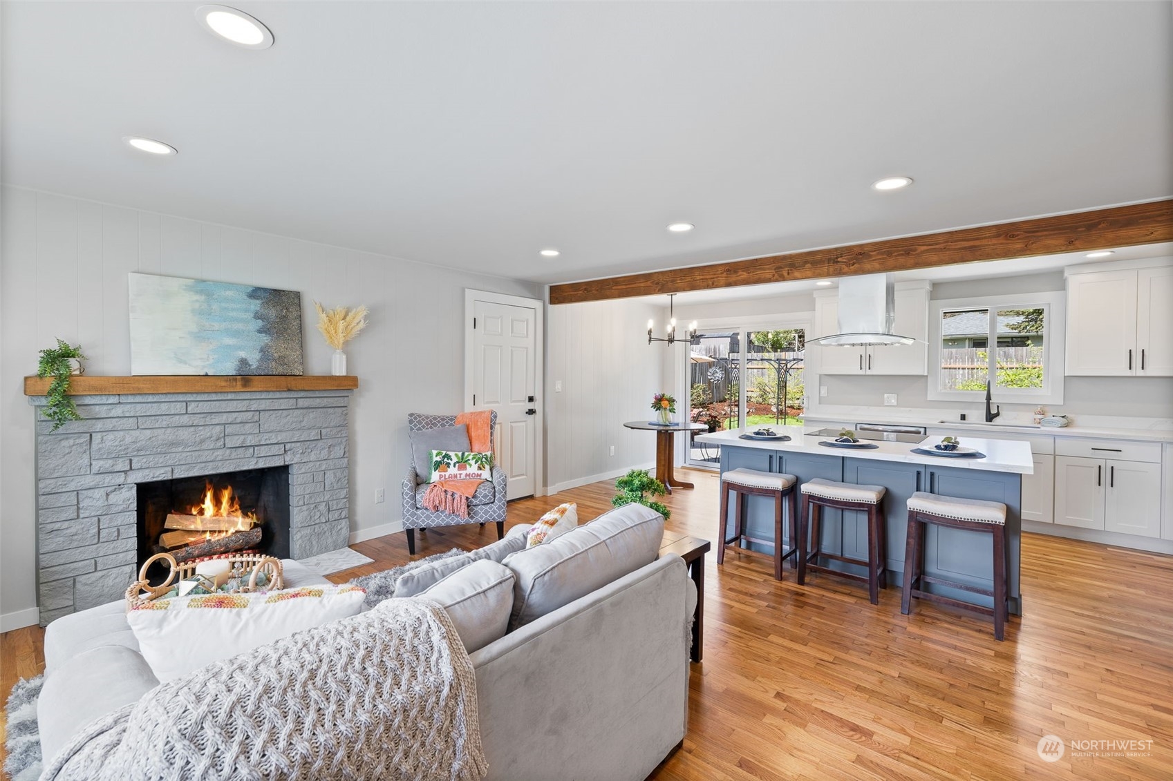 103 234th Street Southwest Bothell, WA 98021 - Photo 4 of 30 a living room with furniture and a fireplace