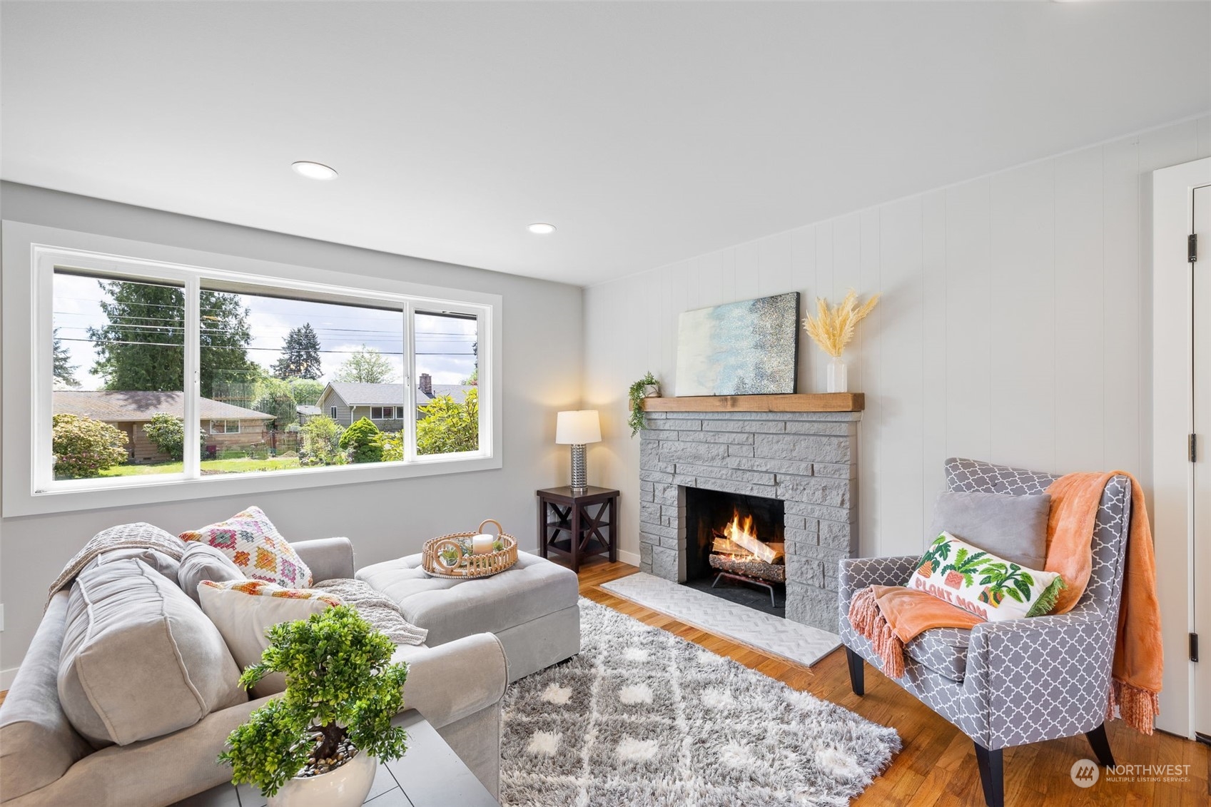 103 234th Street Southwest Bothell, WA 98021 - Photo 6 of 30 a living room with furniture and a fireplace
