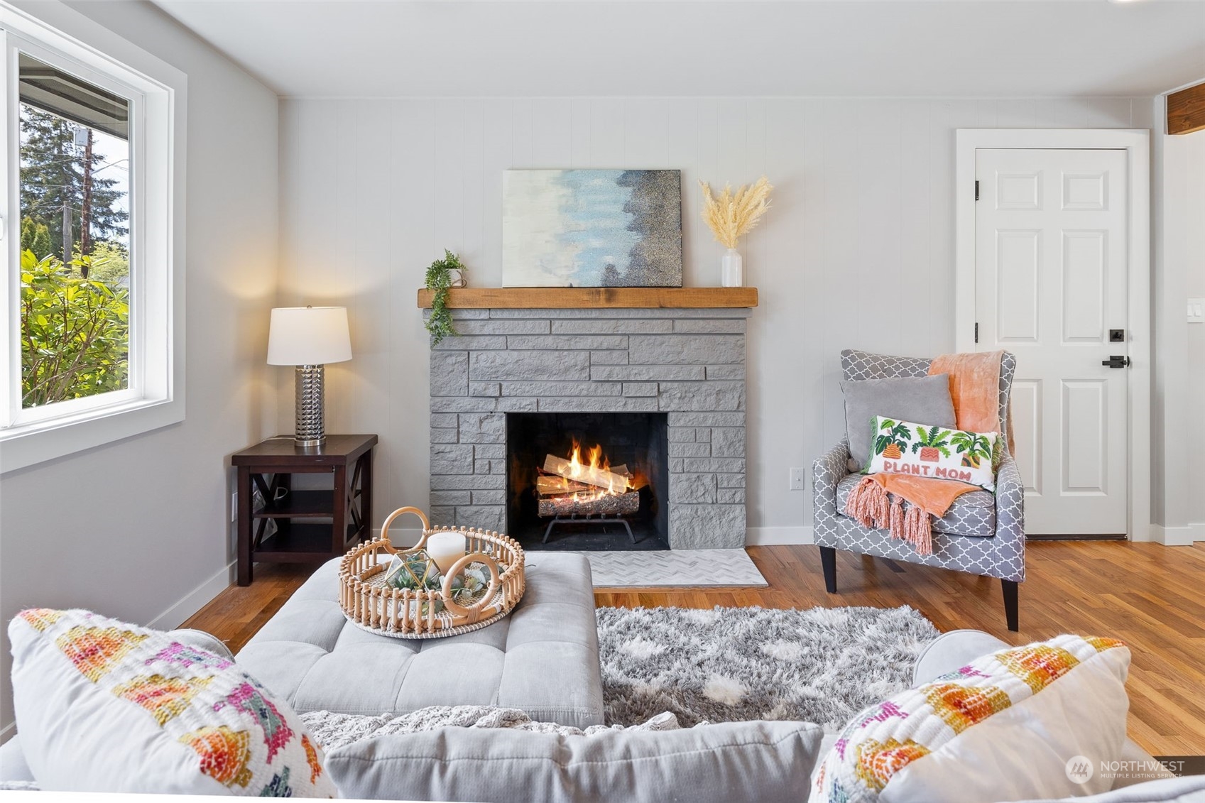 103 234th Street Southwest Bothell, WA 98021 - Photo 7 of 30 a living room with furniture and a fireplace