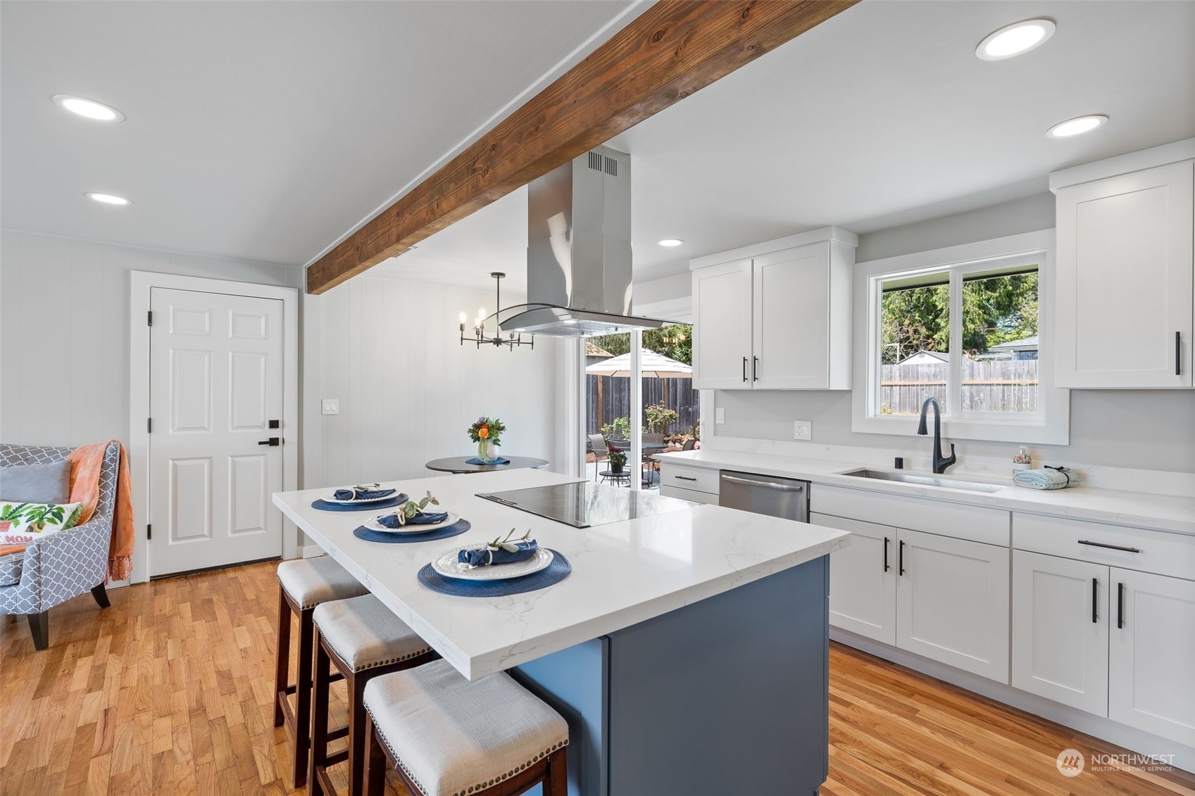 103 234th Street Southwest Bothell, WA 98021 - Photo 10 of 30 a kitchen with a sink cabinets and wooden floor