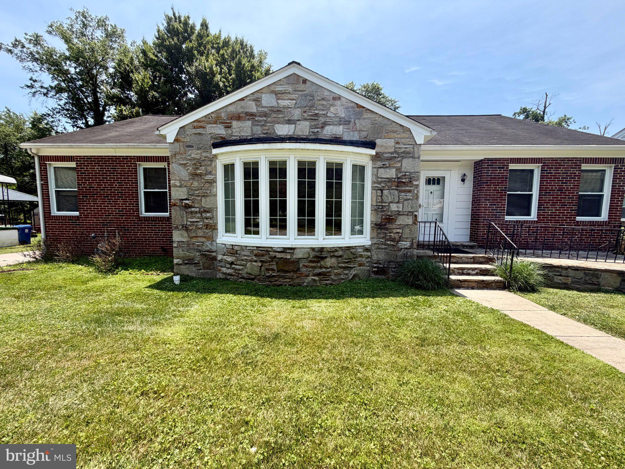 6318 Winner Avenue Baltimore, MD 21215 - Photo 4 of 75 front view of a house with a yard