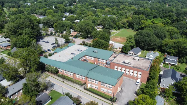 an aerial view of a house with a garden