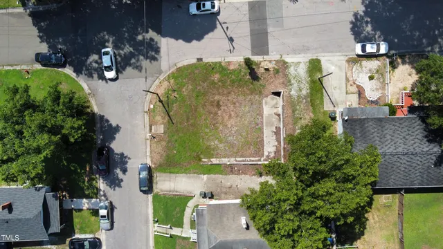 an aerial view of multiple house with outdoor space