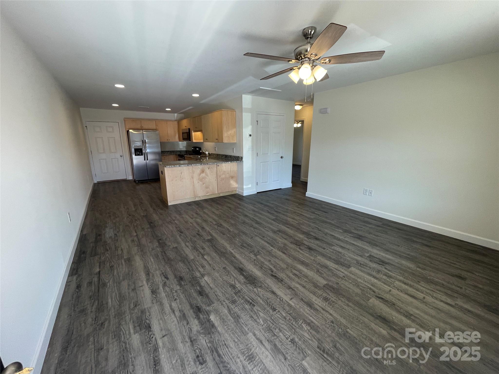 4020 Eugene Drive Lincolnton, NC 28092 - Photo 2 of 13 a view of a kitchen with a sink and a refrigerator