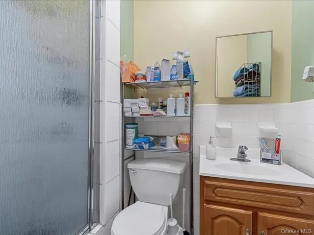 a bathroom with a toilet and a sink