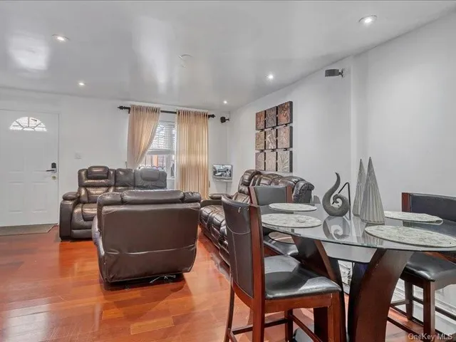 a view of a dining room with furniture window and outside view
