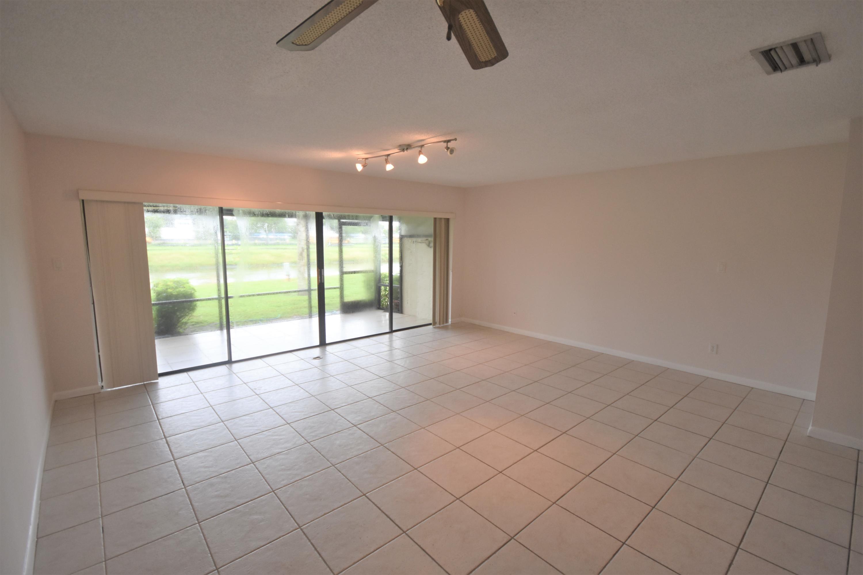 8840 Southwest 22nd Street, Unit 42C Boca Raton, FL 33433 - Photo 8 of 18 Living/Dining Room