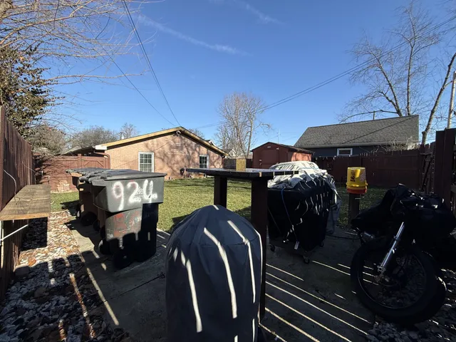 a view of a back yard of the house