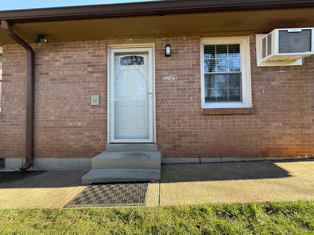 a view of house with front door